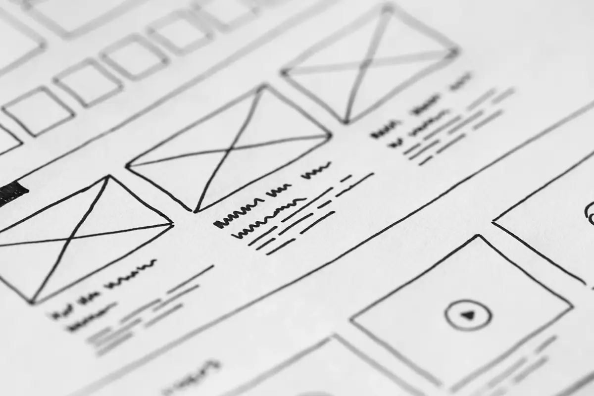 A mockup of a hand drawn wireframe for a website design
